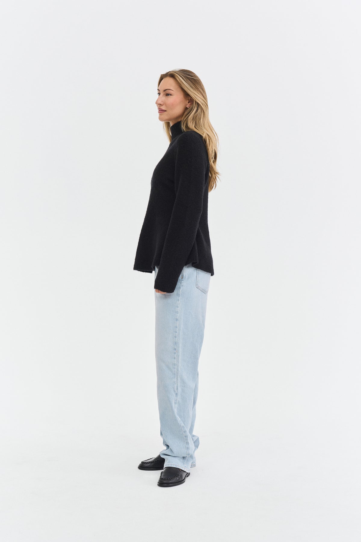 THE PEPLUM HIGH NECK KNIT