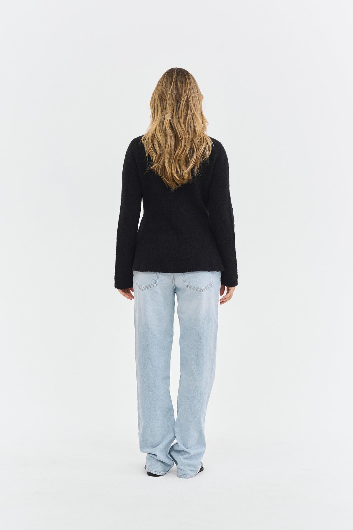THE PEPLUM HIGH NECK KNIT