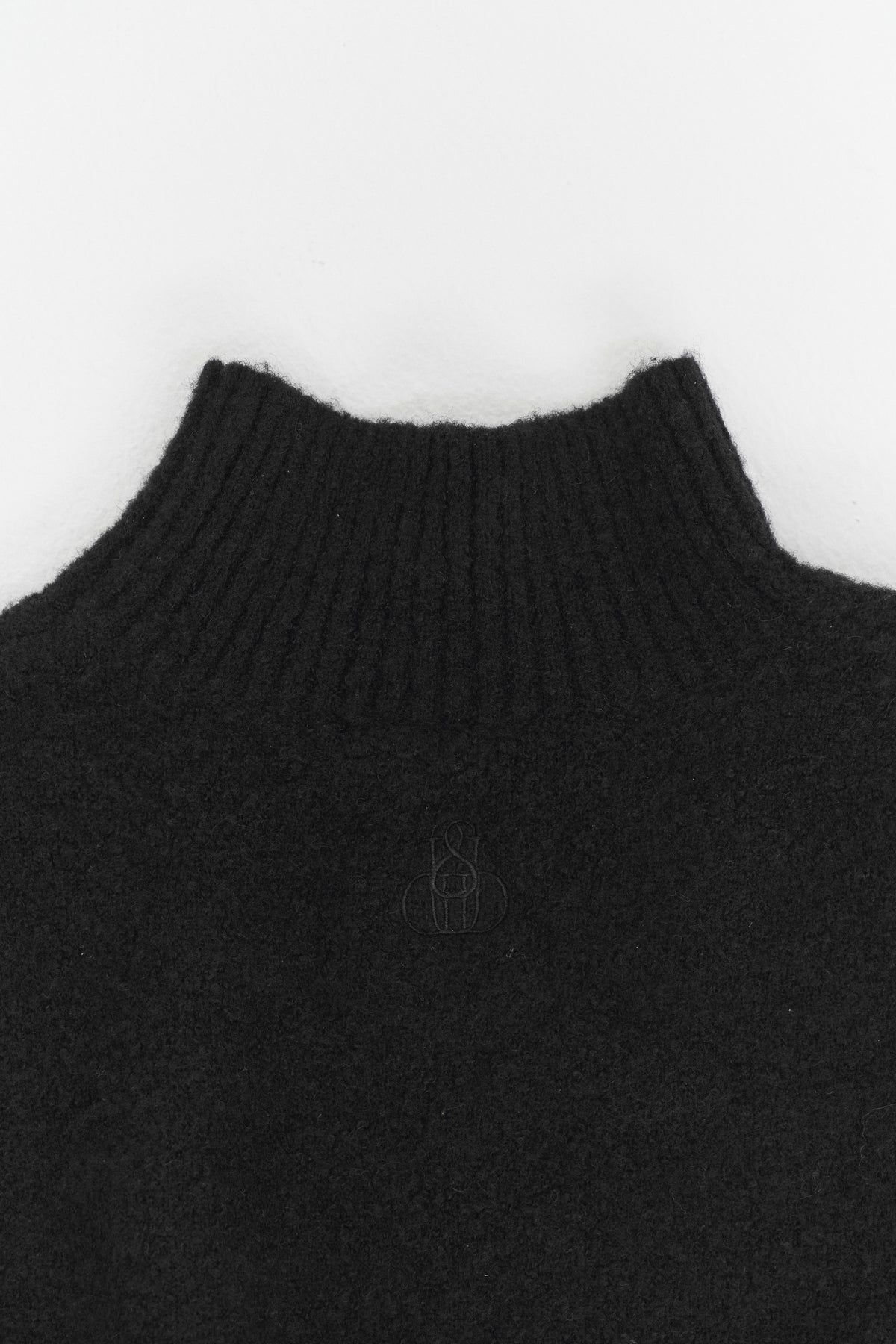 THE PEPLUM HIGH NECK KNIT