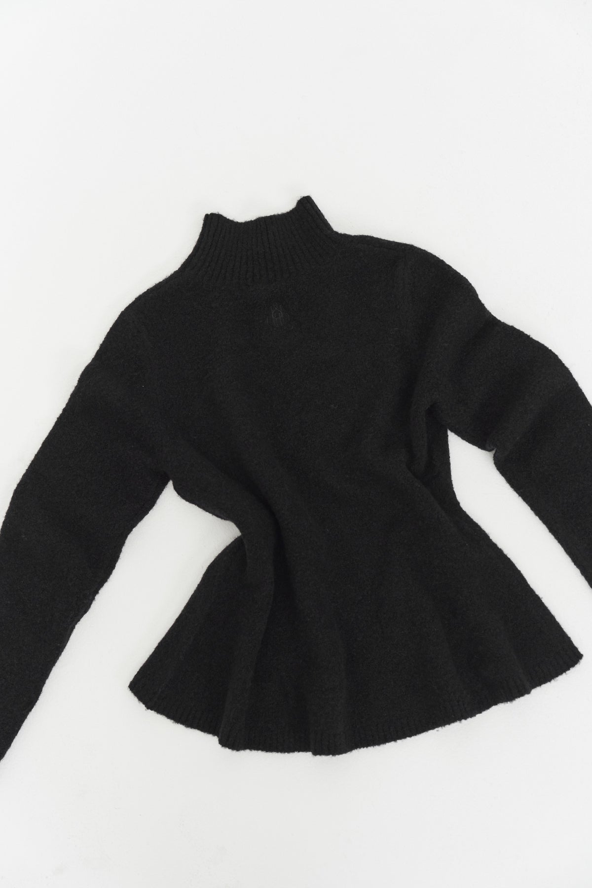 THE PEPLUM HIGH NECK KNIT